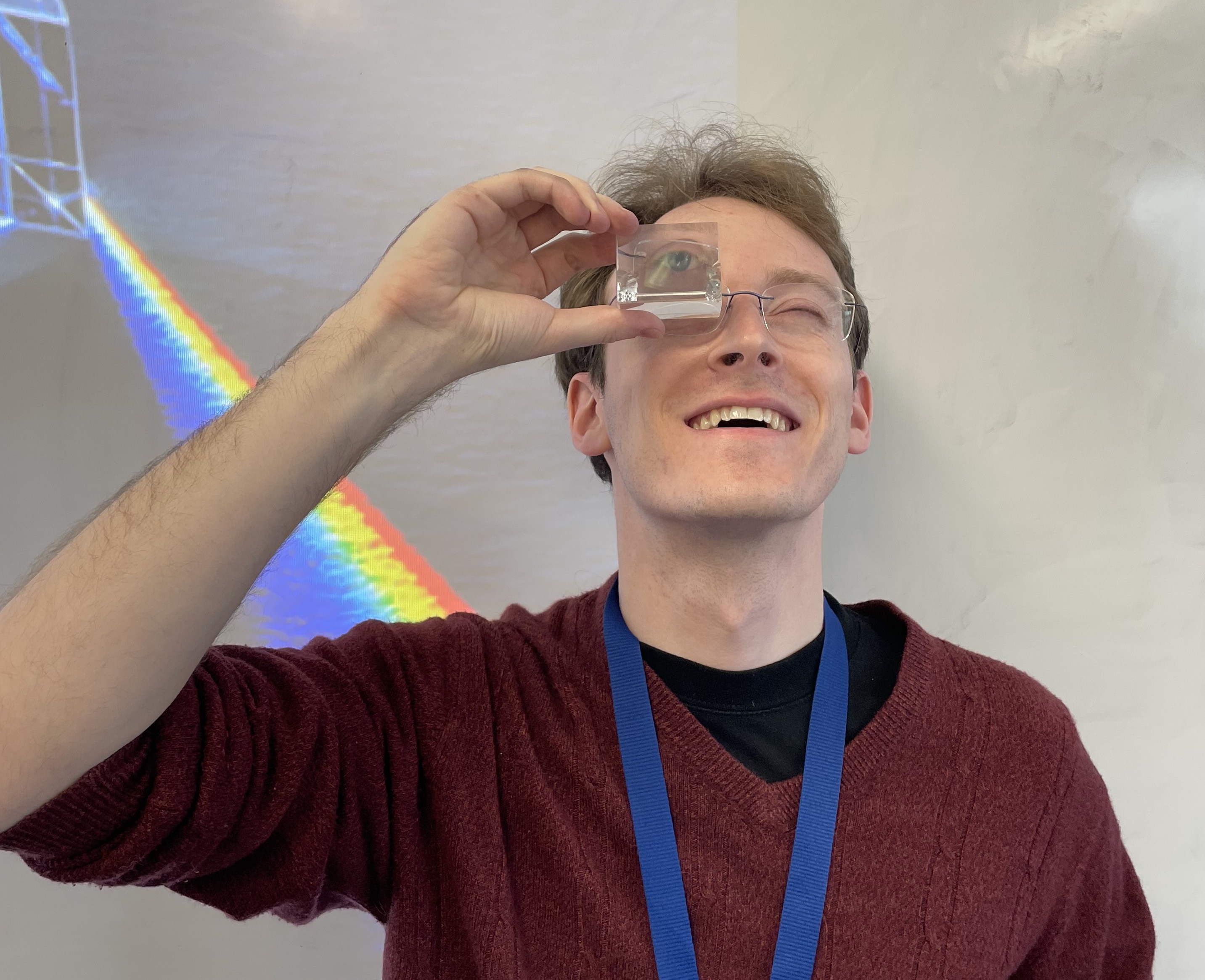 Allen looking through a prism.